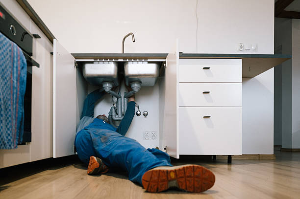 Professional Plumbing technician working in Wales, WI